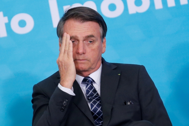 Presidente Jair Bolsonaro durante cerimônia no Palácio do Planalto Macaque in the trees